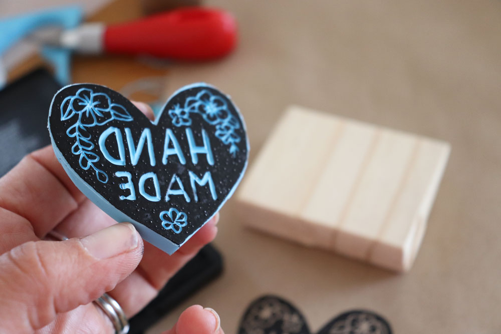 Heart shaped stamp inscribed Hand Made