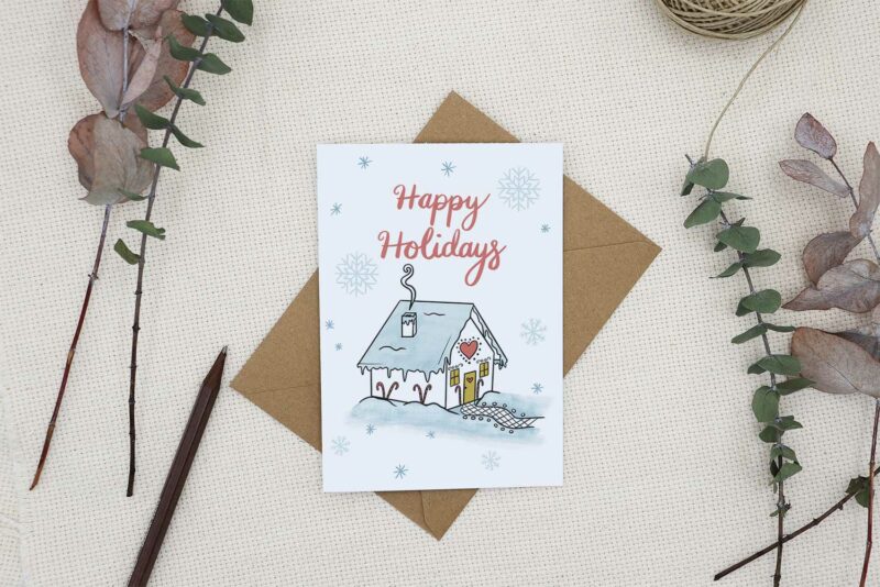 Happy Holidays Card with Gingerbread House in the snow